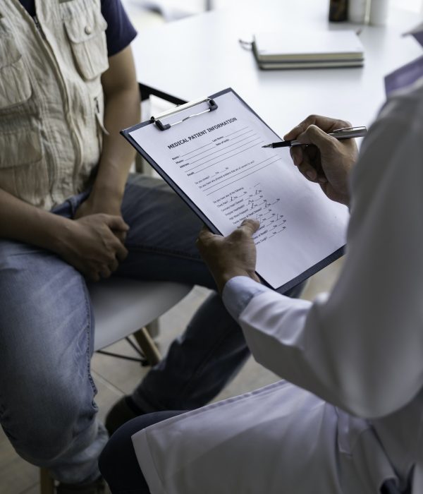 Male health concepts. Doctor is examining the health of the patient and is consultant for health car